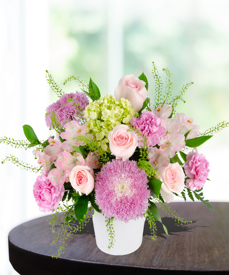 Blooms for Mom Flower Arrangement: A classy mix of pink and green flowers  in a beautiful vase