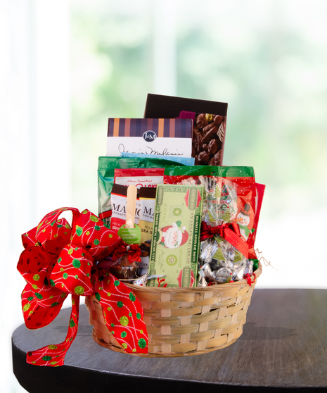 'Tis the Season Christmas Chocoholic Basket filled with assorted premium chocolates and holiday treats, designed by Billy Heroman’s florist in Baton Rouge, La.