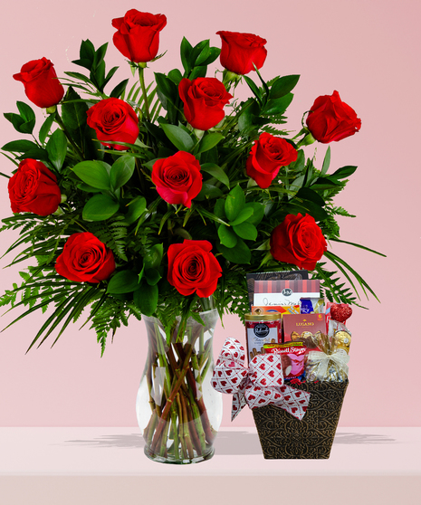 Chocolate Lover’s Delight package with red roses in a glass vase and a gourmet chocolate basket featuring Ferrero Rocher, Lugano truffles, and Russell Stover candies.