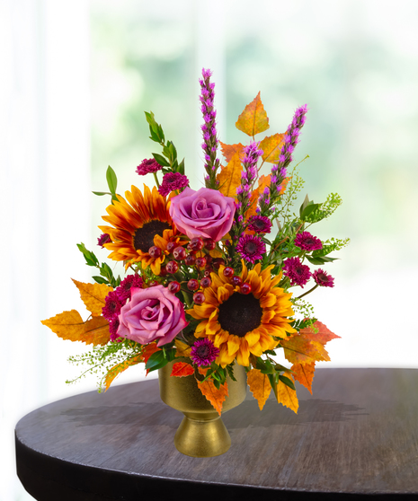 Geaux Gold LSU-inspired flower arrangement featuring gold and purple blooms by Billy Heroman’s in Baton Rouge, La