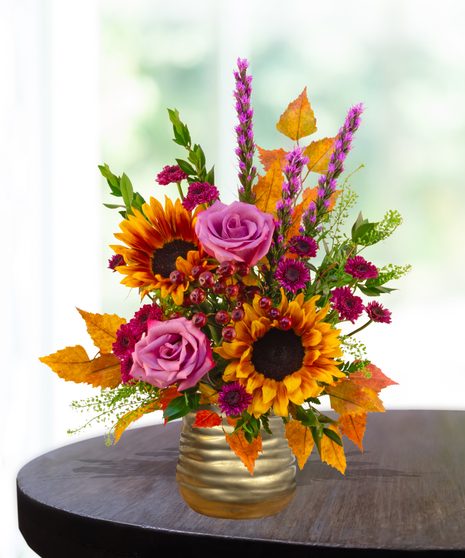 Geaux Gold LSU-inspired flower arrangement featuring gold and purple blooms by Billy Heroman’s in Baton Rouge, La