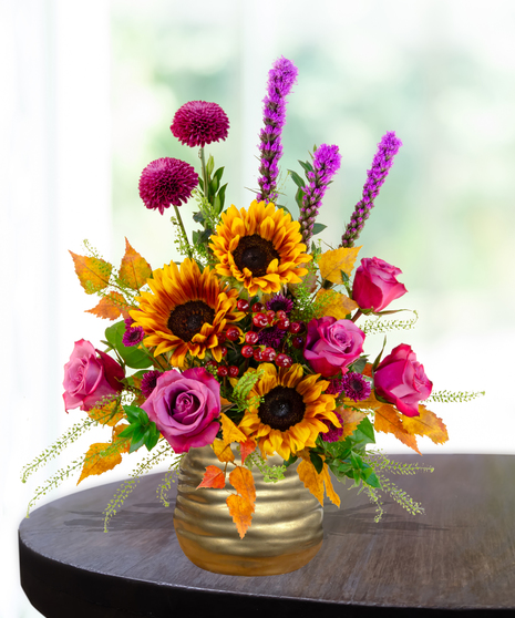 Geaux Gold LSU-inspired flower arrangement featuring gold and purple blooms by Billy Heroman’s in Baton Rouge, La