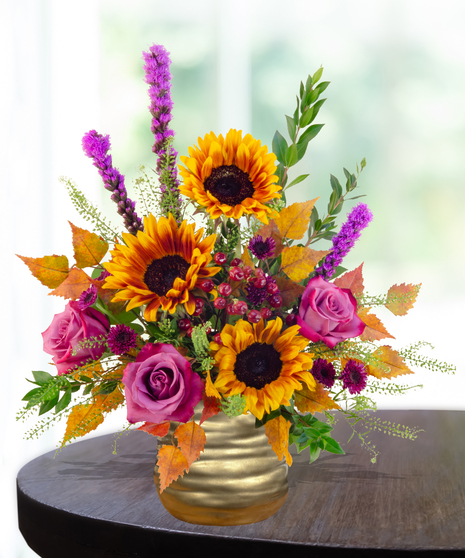 Geaux Gold LSU-inspired flower arrangement featuring gold and purple blooms by Billy Heroman’s in Baton Rouge, La