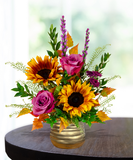 Geaux Gold LSU-inspired flower arrangement featuring gold and purple blooms by Billy Heroman’s in Baton Rouge, La