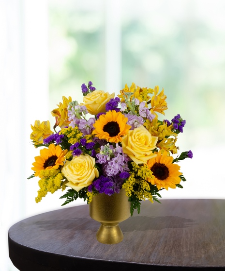 yellow roses, sunflowers, purple stock, purple statice, solidago,  delivered in  Baton Rouge, LA Billy Heroman's