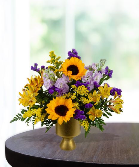 yellow roses, sunflowers, purple stock, purple statice, solidago,  delivered in  Baton Rouge, LA Billy Heroman's