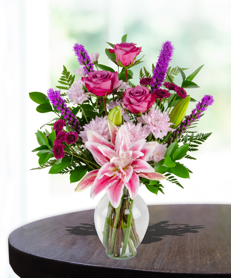 Lovely Lavenders Flower Arrangement for Mother's Day: A stunning display of lavender-hued blooms in a chic vase