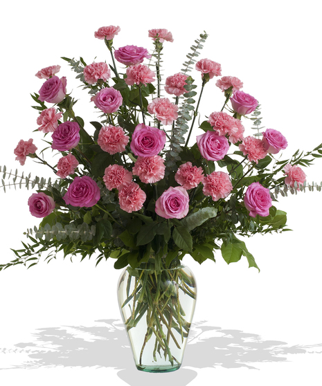 Roses and Carnations in the colors of your choice in a vase delivered to the service in Baton Rouge LA