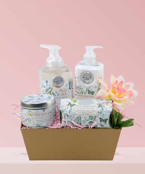 Spa Time, My Valentine Bath & Body Gift Set featuring Michel Design Works Butterfly Fields fragrance products in a woven basket, accented with a pink rose.