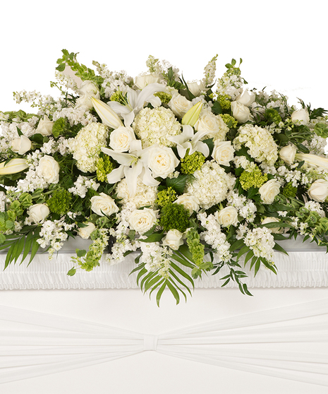 White and Green flowers for the casket delivered Baton Rouge